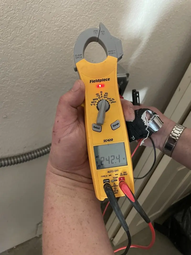 Voltage testing with clamp meter during Aluminum Wiring Replacement in Shenandoah